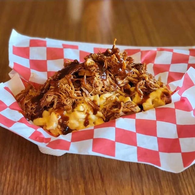 Mac & Cheese Bowl topped with Pulled Chicken, Pork or Beef Barbecue.